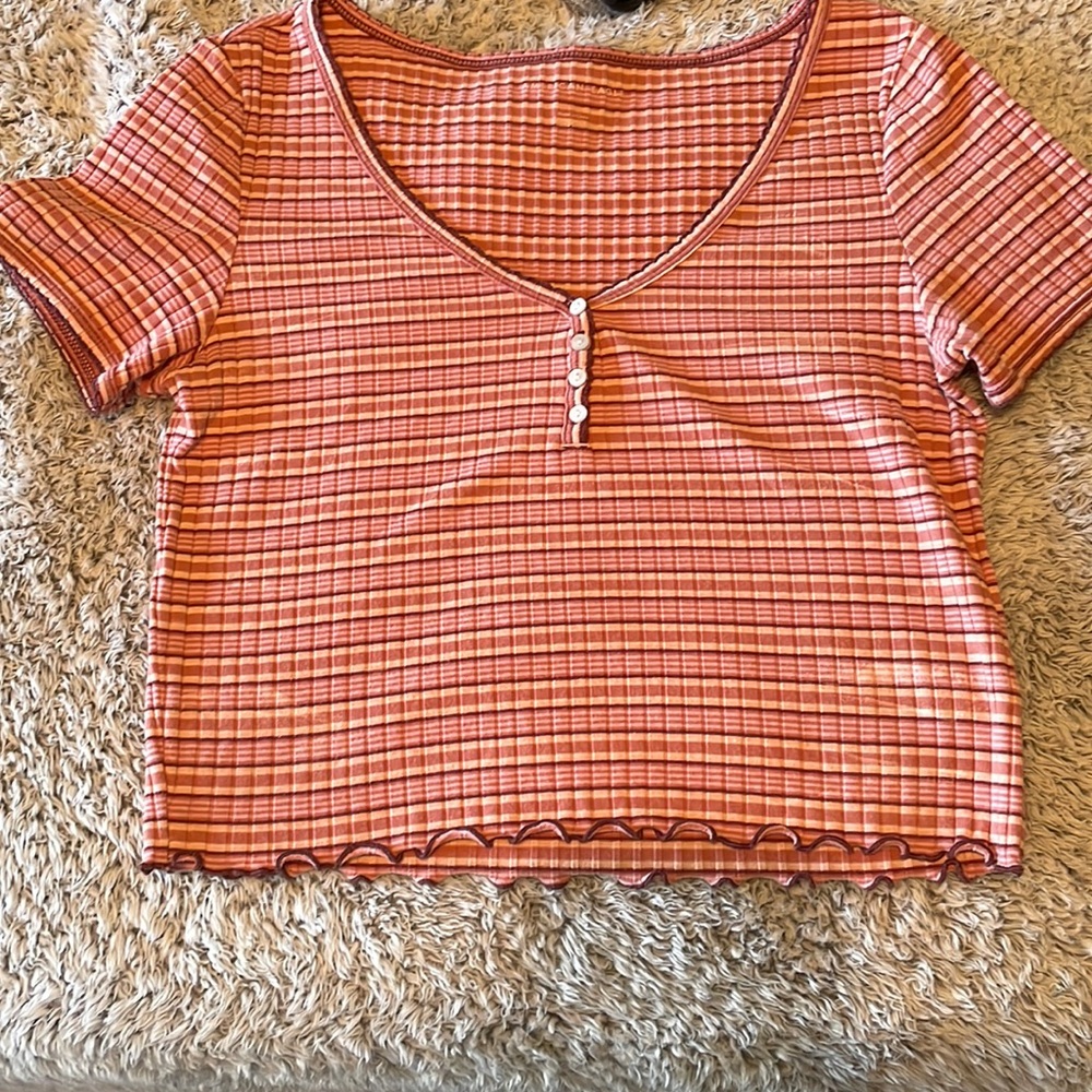 It’s a small but it can also fit a medium.